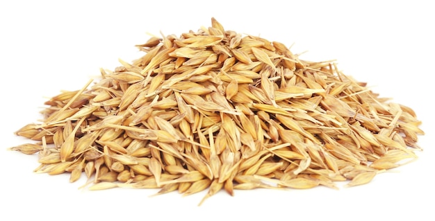 Fresh oats over white background