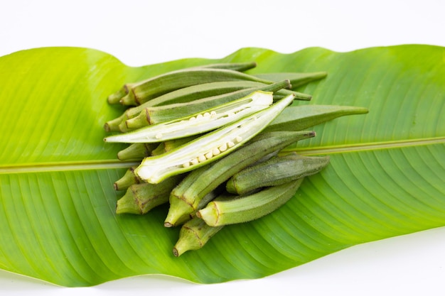 Fresh okra on green leaf