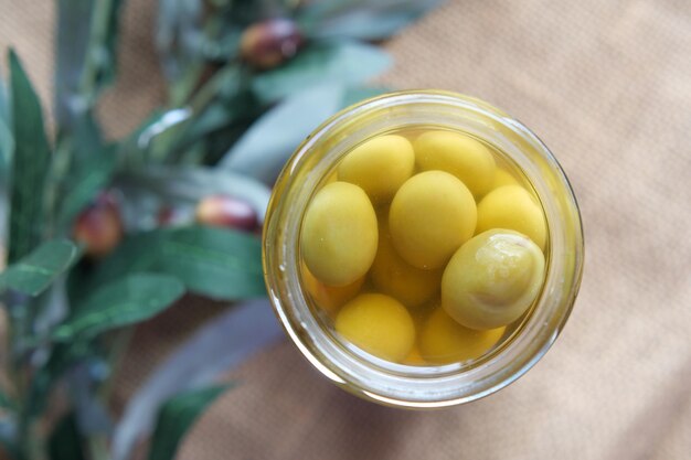 Fresh olive in a container on table