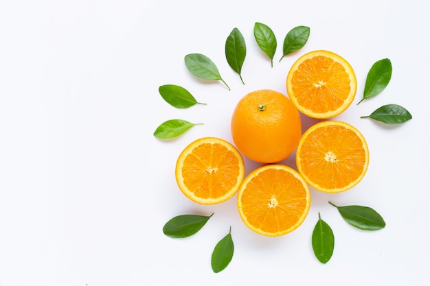 Fresh orange citrus fruit with leaves isolated on white