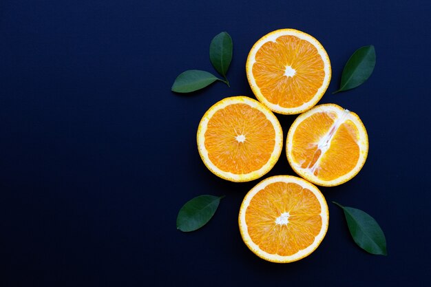 Fresh orange fruit on dark