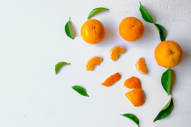 Fresh orange fruit on a white table