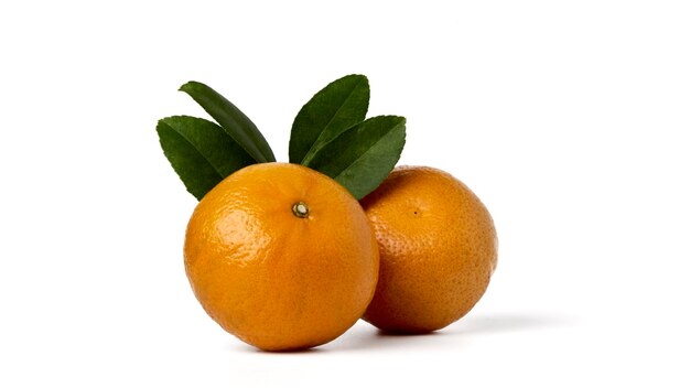 Fresh orange fruit with leaf on white background.