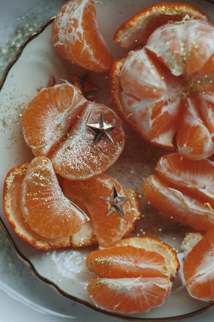 Fresh orange fruit with leaves citrusy and vibrant highresolution studio image