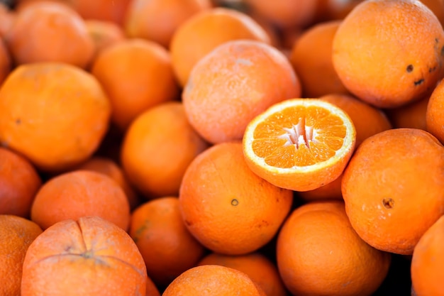 Fresh orange fruits as background top view Close up