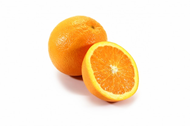 Fresh orange fruits cut isolated on white background