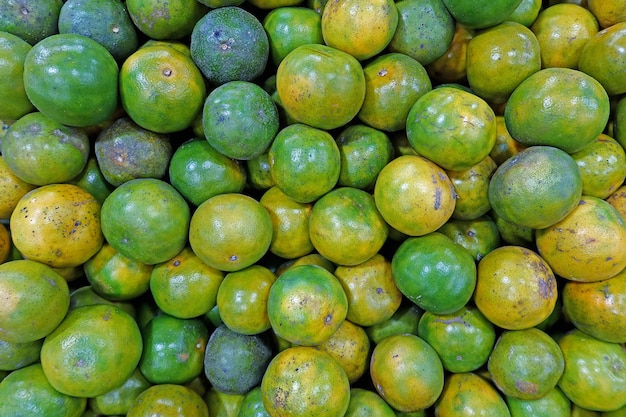 fresh orange fruits on top view as background