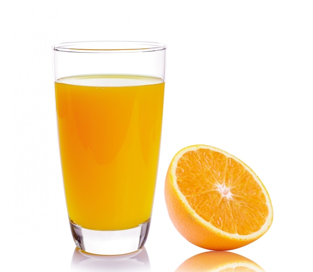 Fresh orange and glass with juice