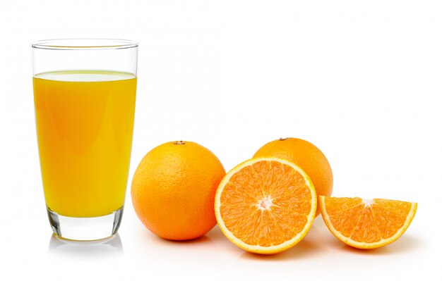 Fresh orange and glass with juice