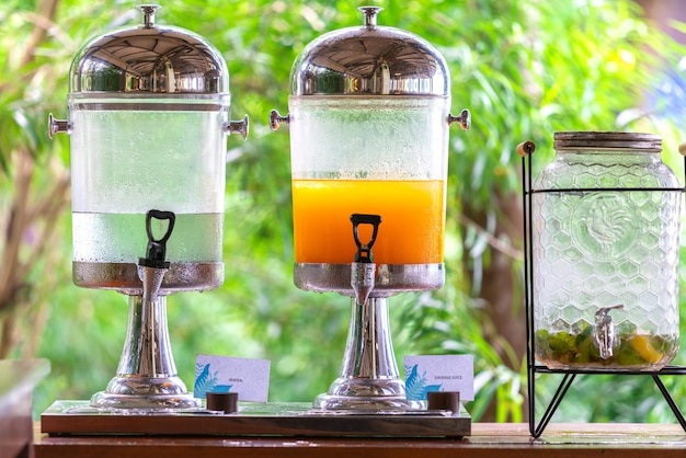 Fresh orange juice from fresh orange with high vitamin c from farm in pitcher or jar for freshness in morning with breakfast in restaurang hotel and resort for healthy