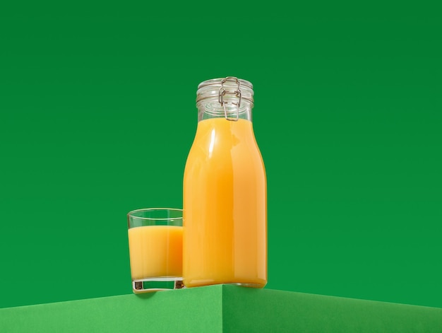 Fresh orange juice Healthy organic drink on a green background