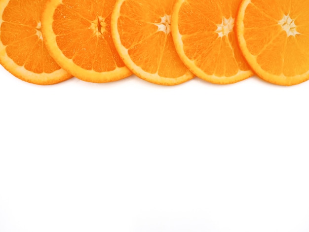 Fresh orange slice on white background, with copy or free space for text.