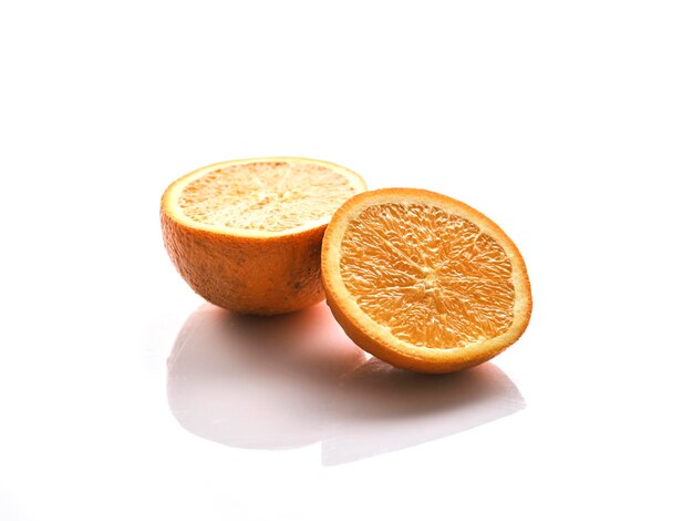 A fresh orange on a white background