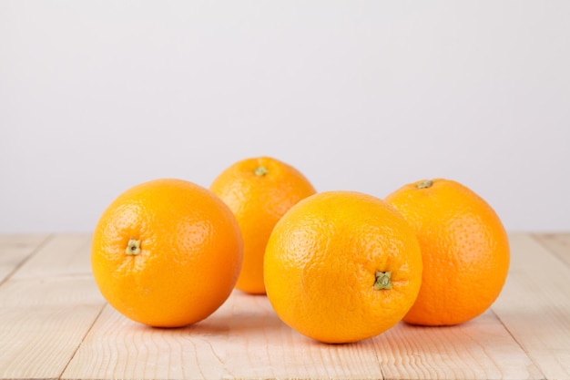 Fresh orange on wood table