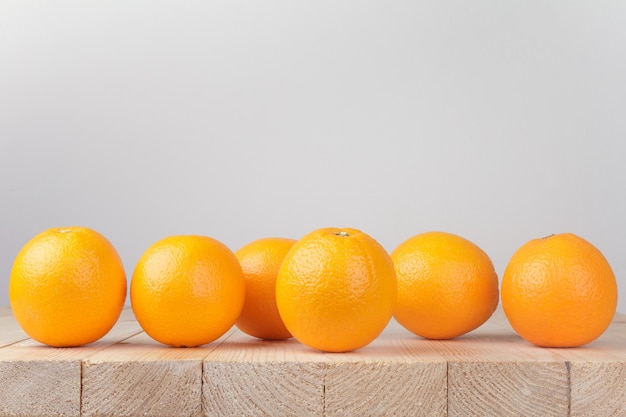 Fresh orange on wood table