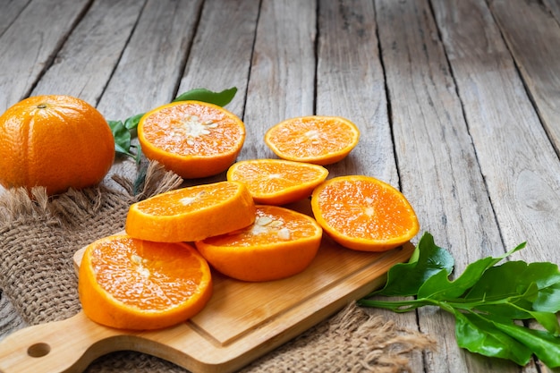 Fresh oranges  fruit  slice on a wooden