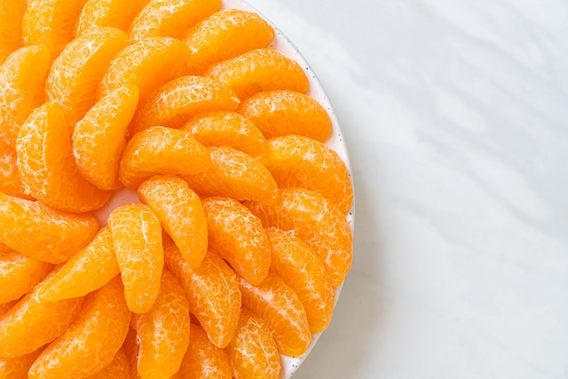 fresh oranges on plate