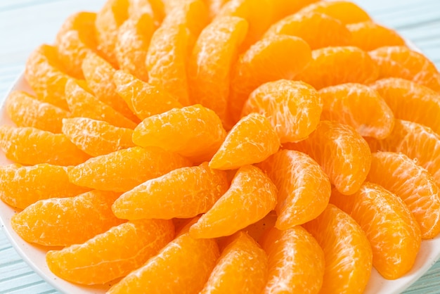 Fresh oranges on plate