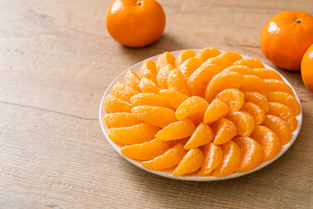 fresh oranges on plate