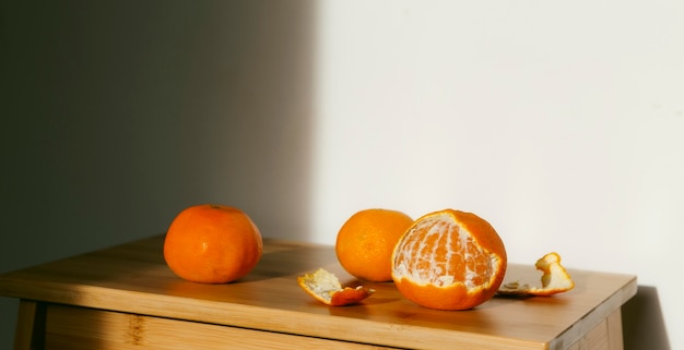 Fresh oranges on table