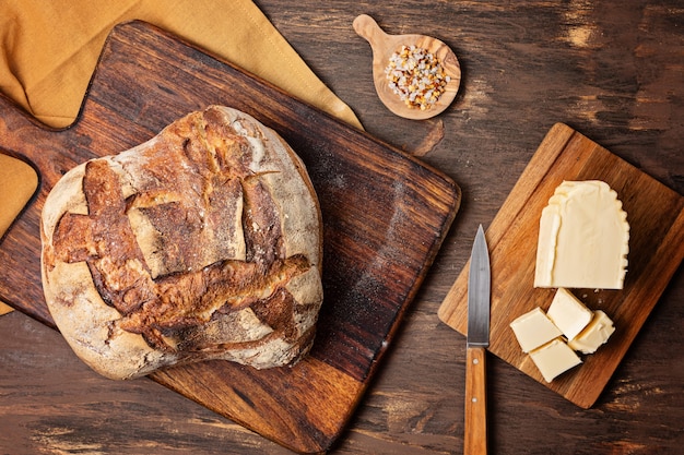 Fresh organic artisan bread. Healthy eating, buy local, homemade bread recipes concept. Top view, flat lay