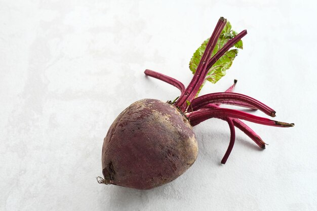 Fresh organic beets or beetroot on a white background Selected focus