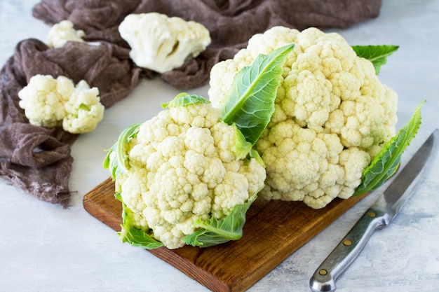 Fresh organic cauliflower on a wooden board