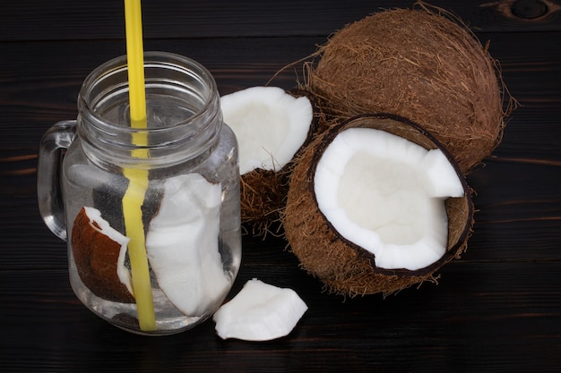 Fresh Organic Coconut Water in a Glass. Food background.