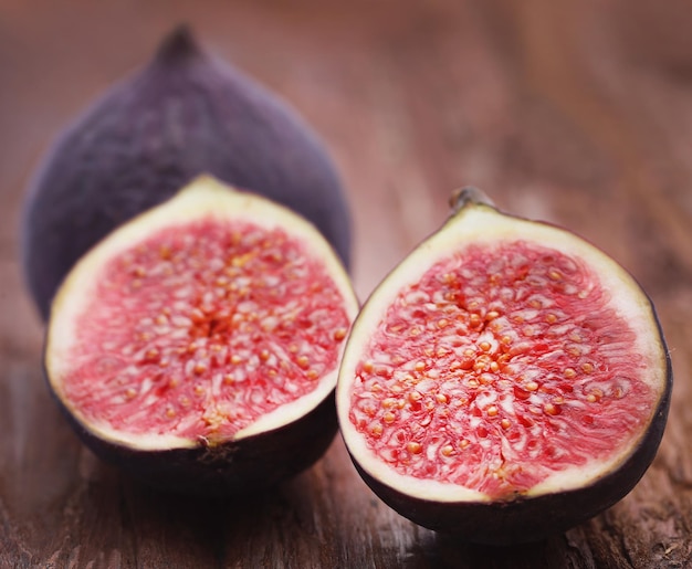 Fresh organic common fig on timber surface