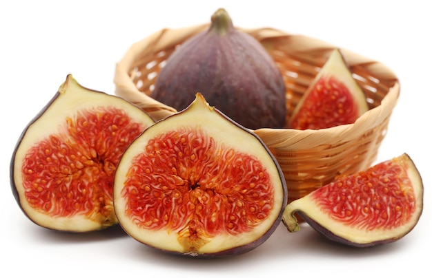 Fresh organic common fig over white background