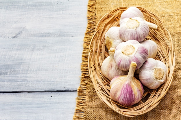 Fresh organic garlic on sackcloth