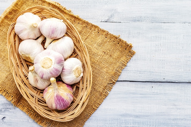 Fresh organic garlic on sackcloth