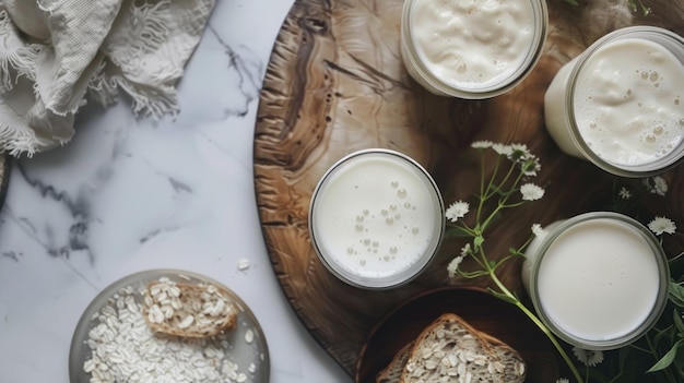 Foto latte biologico fresco e avena su superficie di marmo giornata mondiale del latte
