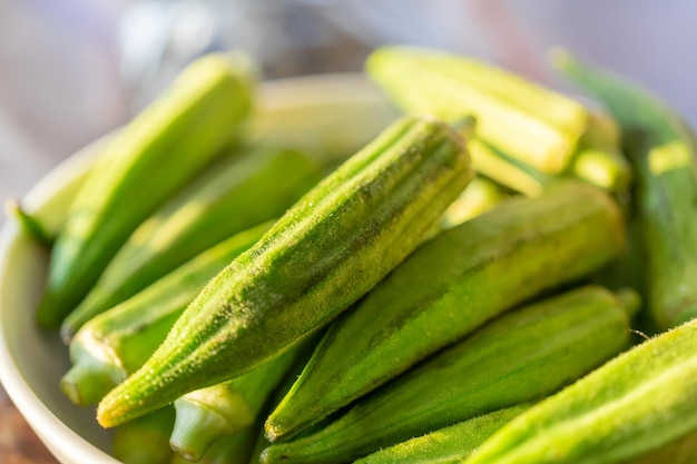 Fresh organic okra in a bowl to cook