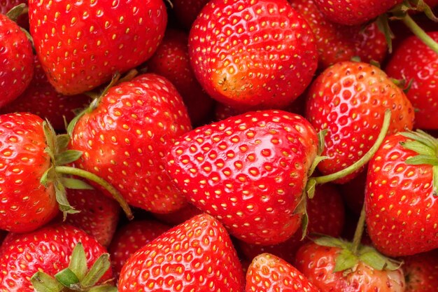 Fresh organic red strawberry fruit background