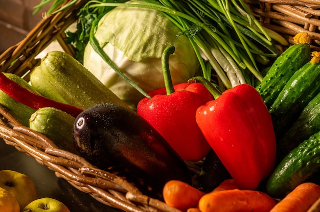 Fresh organic vegetables in a basket. Farm products. Natural fruits and vegetables grown in your garden. High quality photo