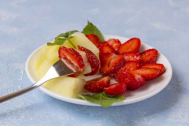 Fresh Organic Vegetarian Fruit Salad on a plate.