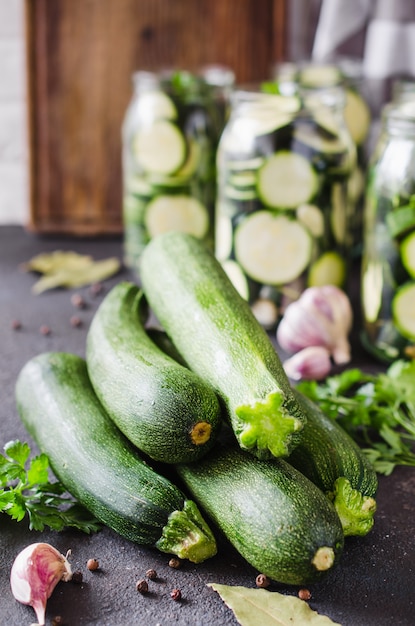 Fresh organic zucchini, garlic and parsley, herbs and spices.