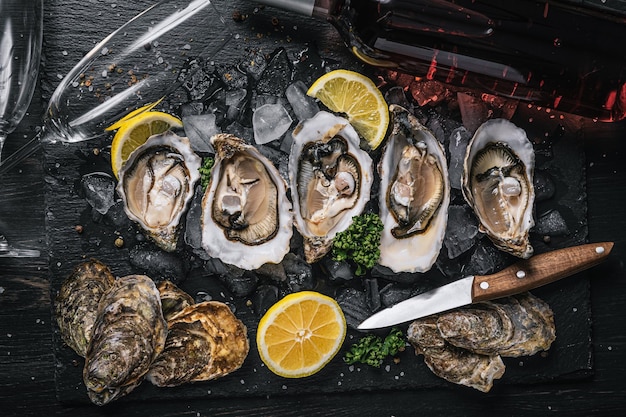 Fresh oysters with lemon ice and white wine