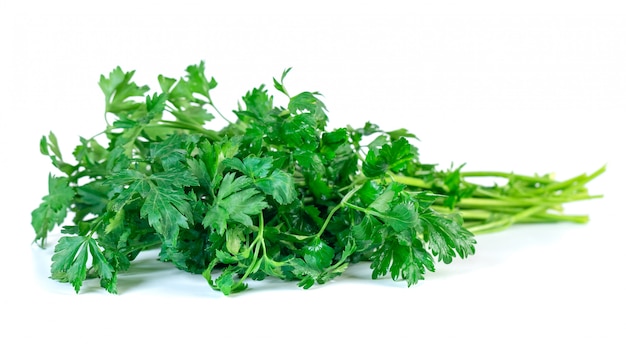 Photo fresh parsley isolated on a white bvegetable.