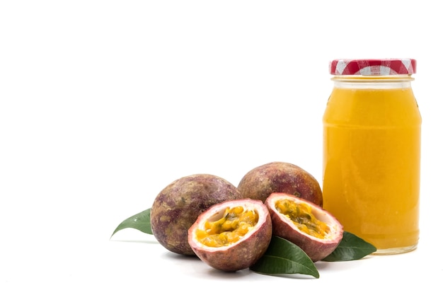 Fresh passion fruit and juice on white background. copy space