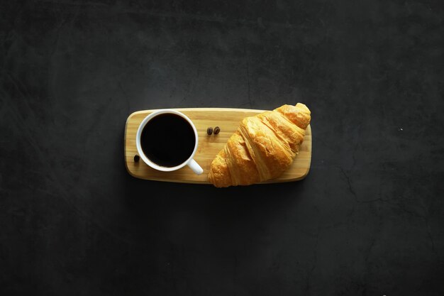 Fresh pastries on the table. French flavored croissant for breakfast.
