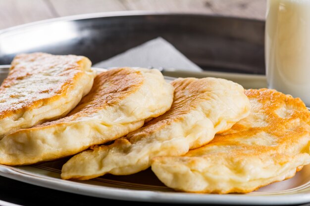 Fresh patties on the wooden table