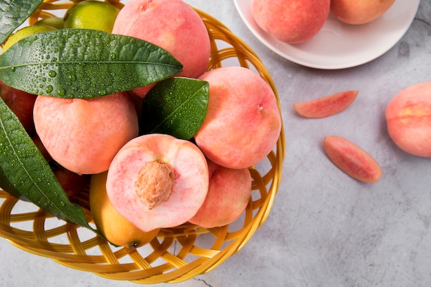 Fresh peach on a  basket