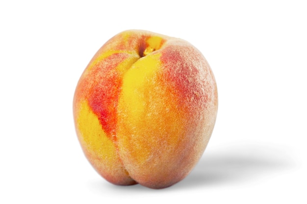 Fresh peach isolated on white background