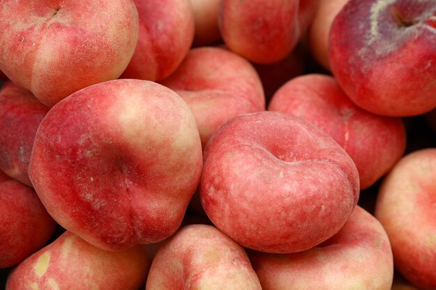 Fresh peaches on market stall