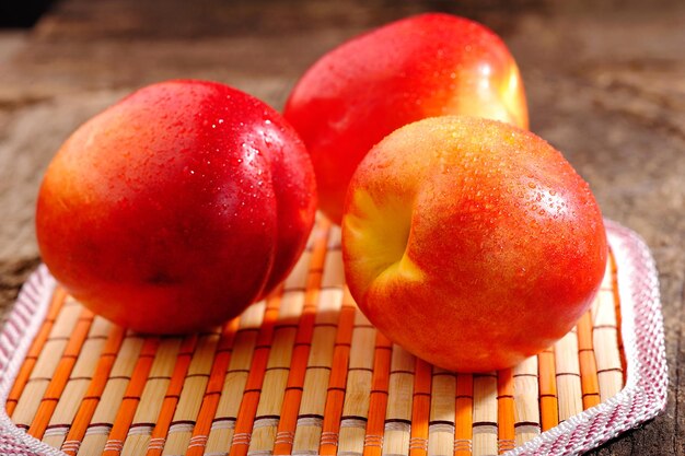 Fresh peaches on the table