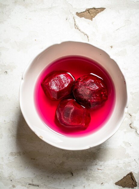 Fresh peeled beets in a bowl.