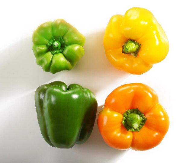 Fresh peppers on white background