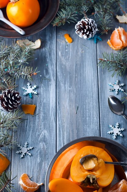 Fresh persimmon fruit and mandarin